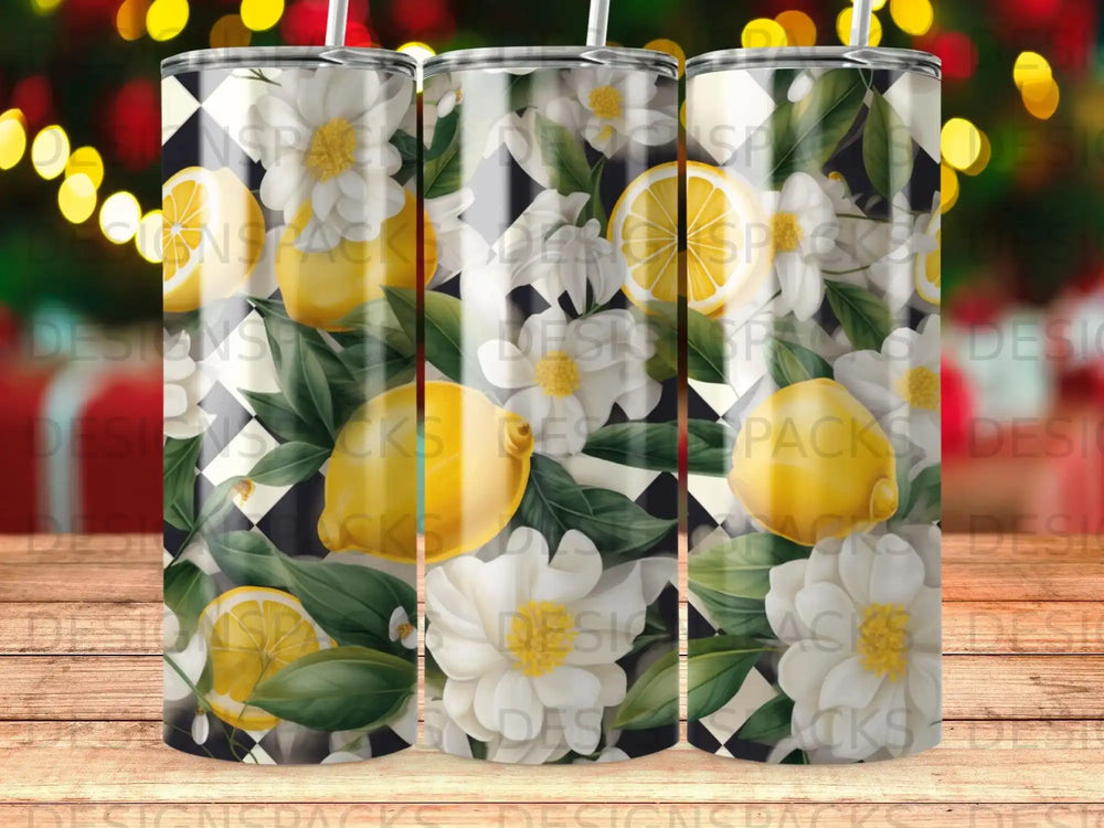 Three tumblers with lemons and white flowers on a black and white checkered background.