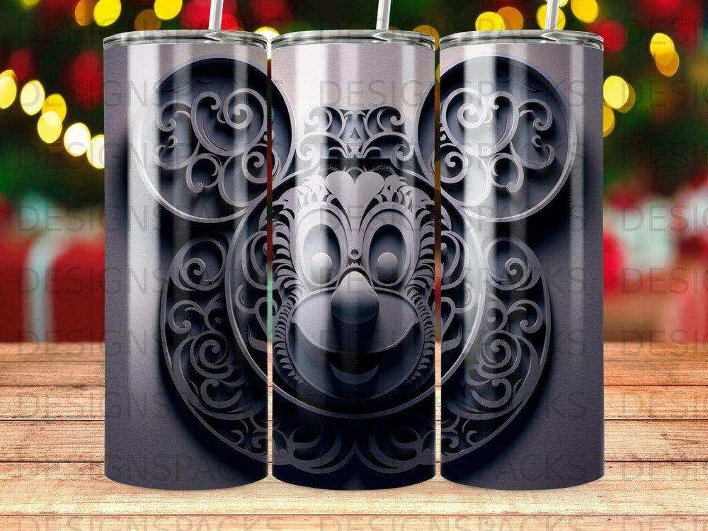 Mickey Mouse silhouette with ornate filigree pattern on a silver tumbler.