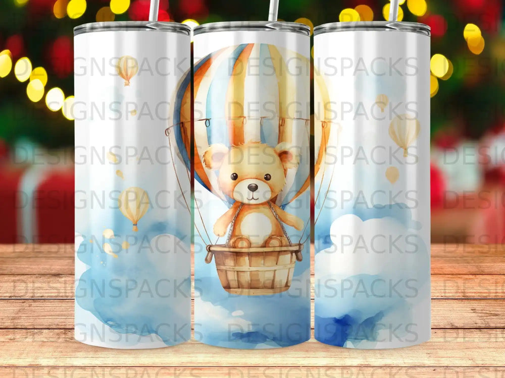 Teddy bear in hot air balloon basket against sky with clouds.