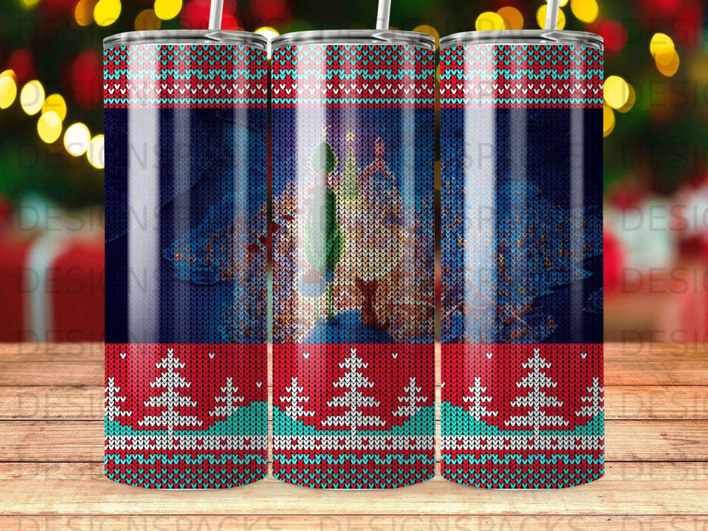 Christmas tree with red, white, and blue knitted pattern on a tumbler.