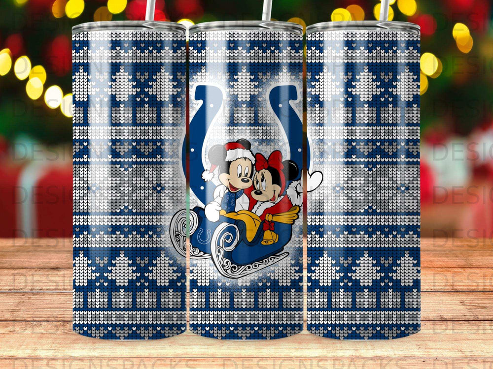 Mickey and Minnie Mouse in a sleigh, on a blue snowflake and horseshoe pattern tumbler.