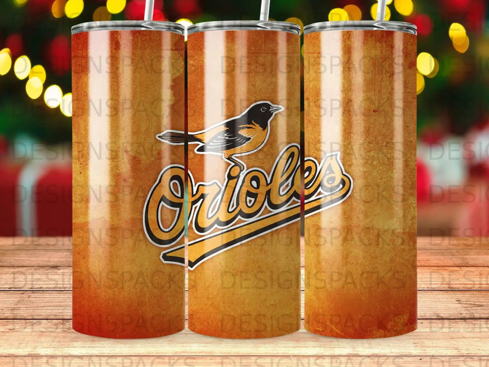 Baltimore Orioles logo on a tumbler with a bokeh background.