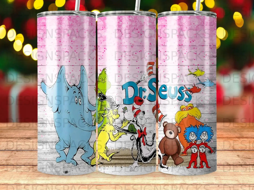Dr. Seuss characters on a pink glitter tumbler with a wooden background.