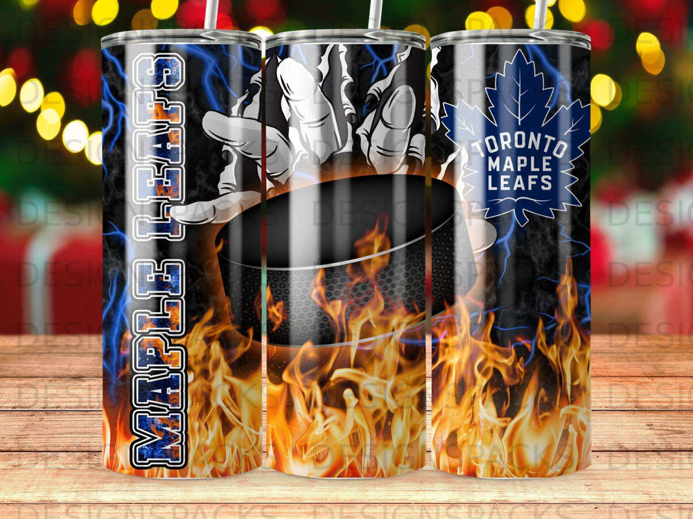 Toronto Maple Leafs logo and hockey puck with flames, on a tumbler.