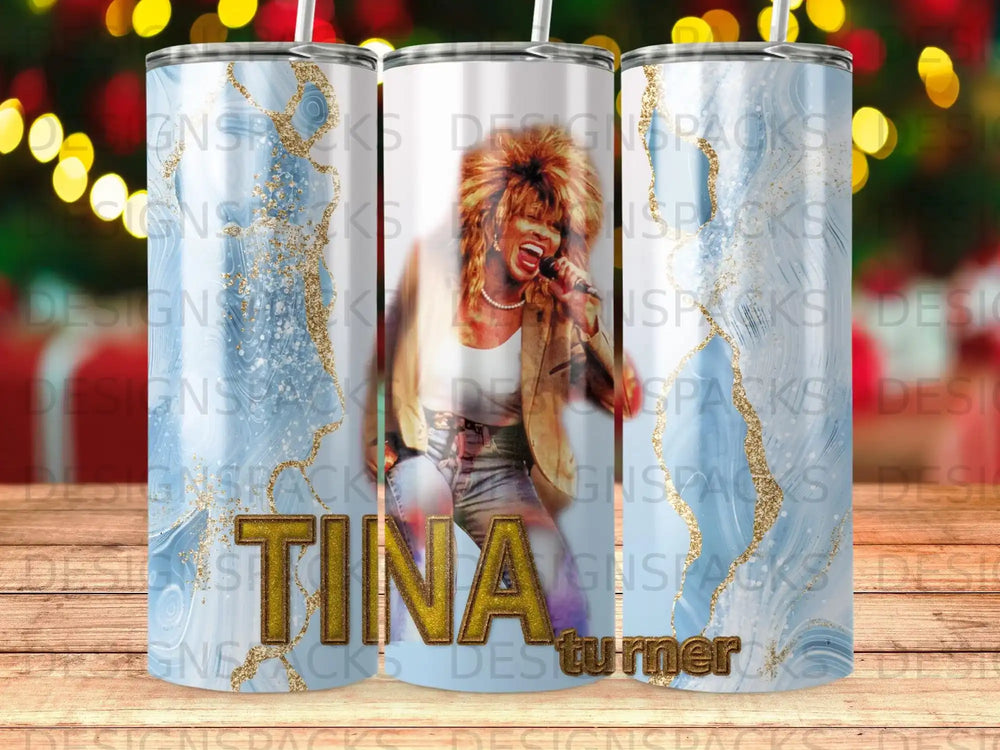 Tina Turner on a tumbler with blue marble and gold glitter background.