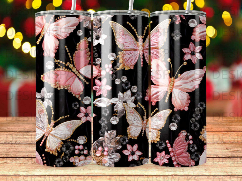 Black tumbler with pink butterflies, flowers, and diamond accents.