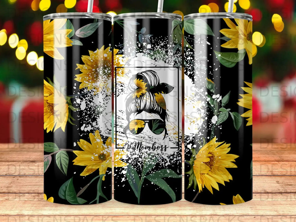 Black tumbler with sunflowers and "Mom boss" text in a messy bun graphic.