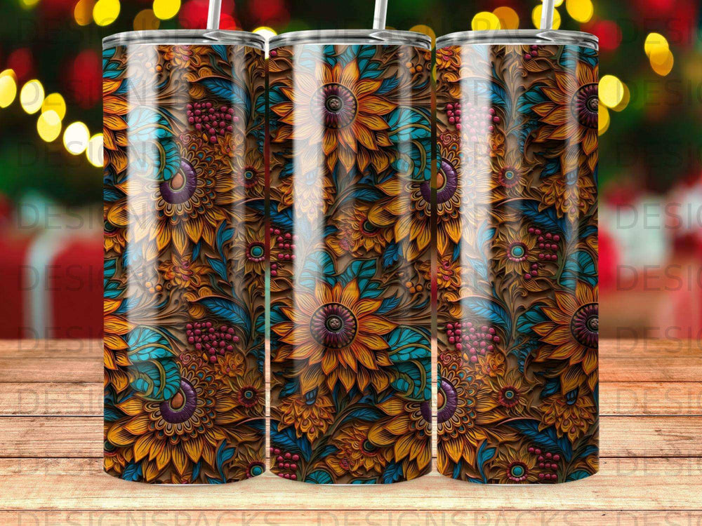 Three tumblers with a repeating floral pattern of sunflowers and intricate scrolling.