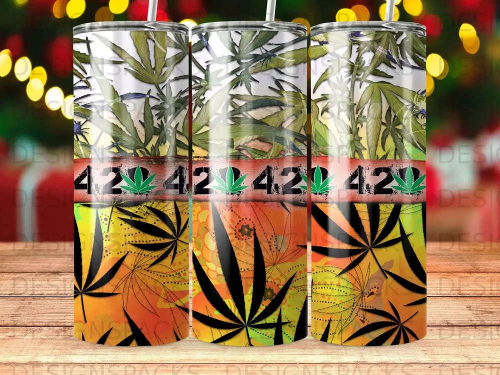 Tumbler with cannabis leaf pattern and bokeh lights.