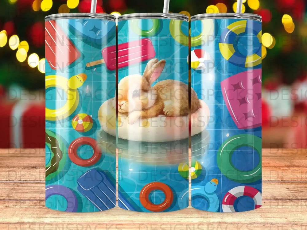 Bunny napping on pool float surrounded by inflatable toys and pool noodles.