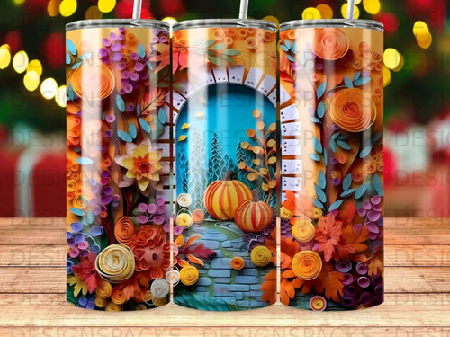 Rolled paper art pumpkin scene on a tumbler.