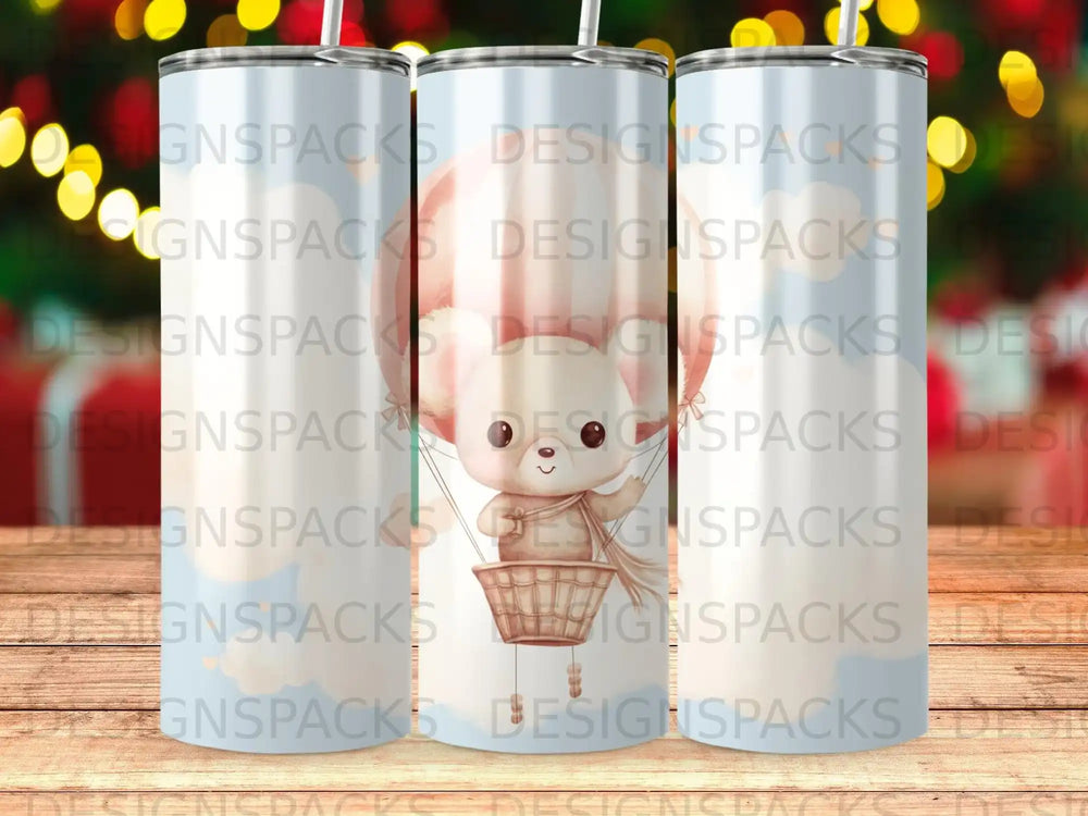 Cartoon bear in hot air balloon on a patterned tumbler.
