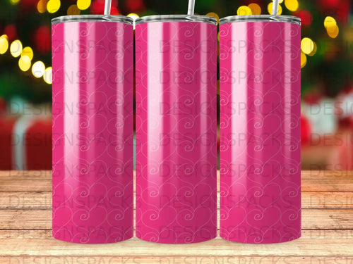 Pink patterned tumbler with blurred bokeh lights background.