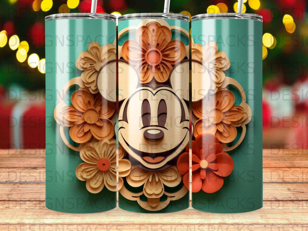 Mickey Mouse face with floral wood cutouts on a teal tumbler.