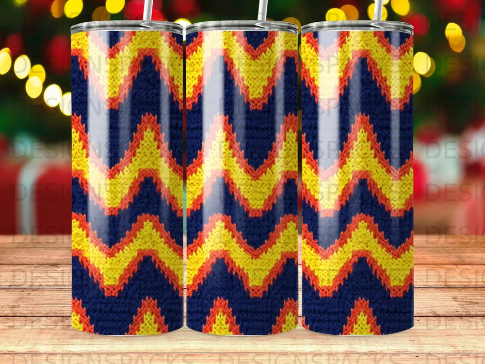 Blue, yellow, and orange zigzag knit pattern on three tumblers.