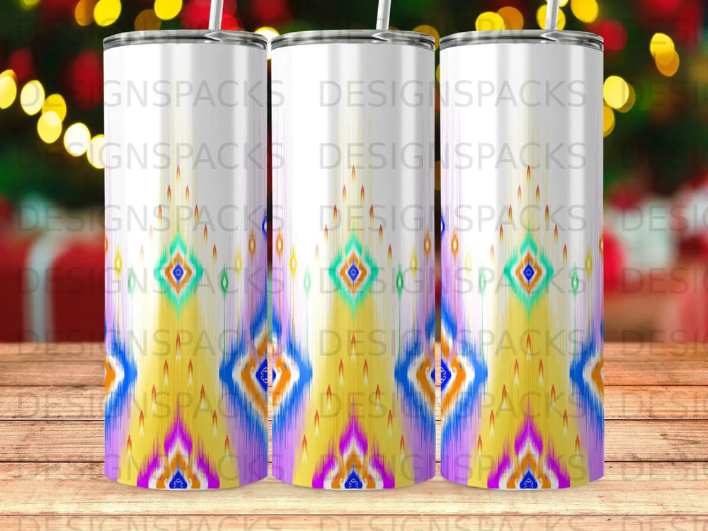 Two tumblers with a geometric pattern, partially obscured by a third tumbler.