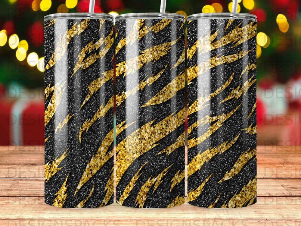 Black tumbler with gold glitter tiger stripes.