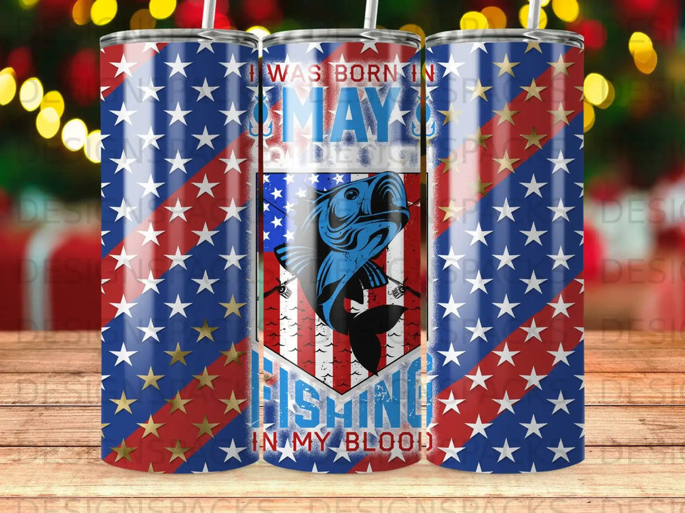Tumbler with red, white, and blue stripes, a fish, and text "May fishing in my blood".