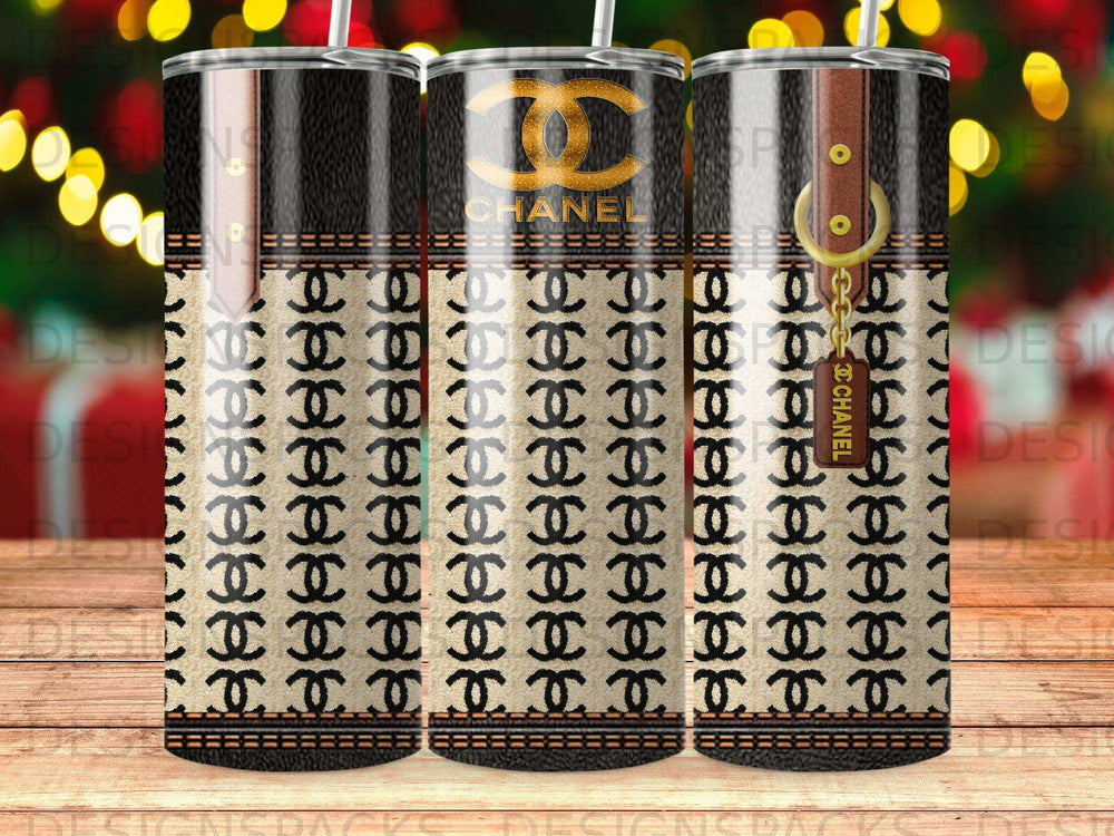 Chanel pattern tumbler with gold chain and leather accents.