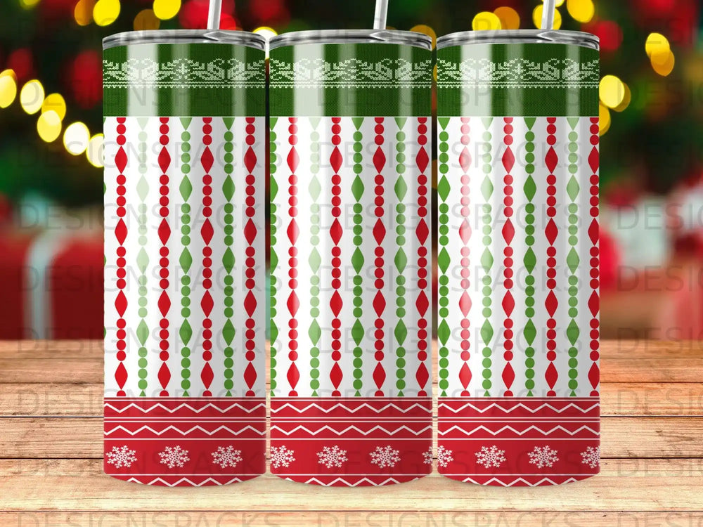 Green and red festive tumbler with snowflake and bead patterns.