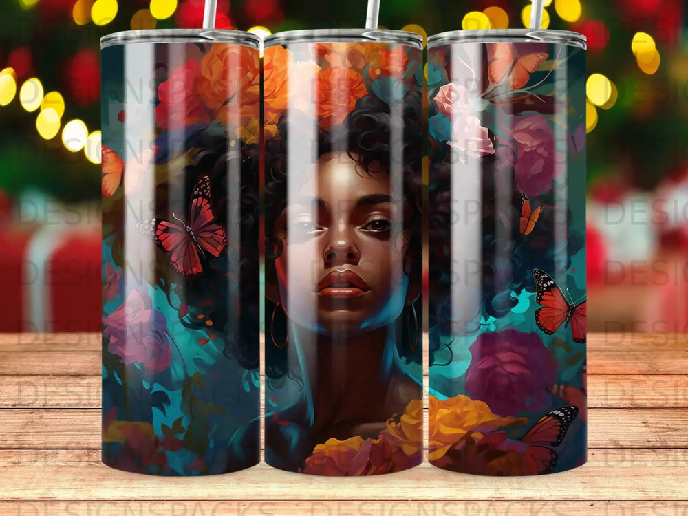Woman with butterfly and floral accents on a tumbler.