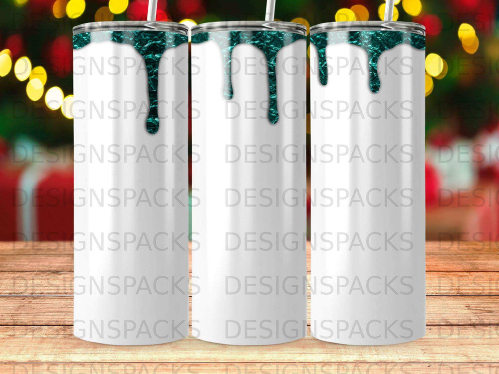 White tumbler with teal drip design and a straw.
