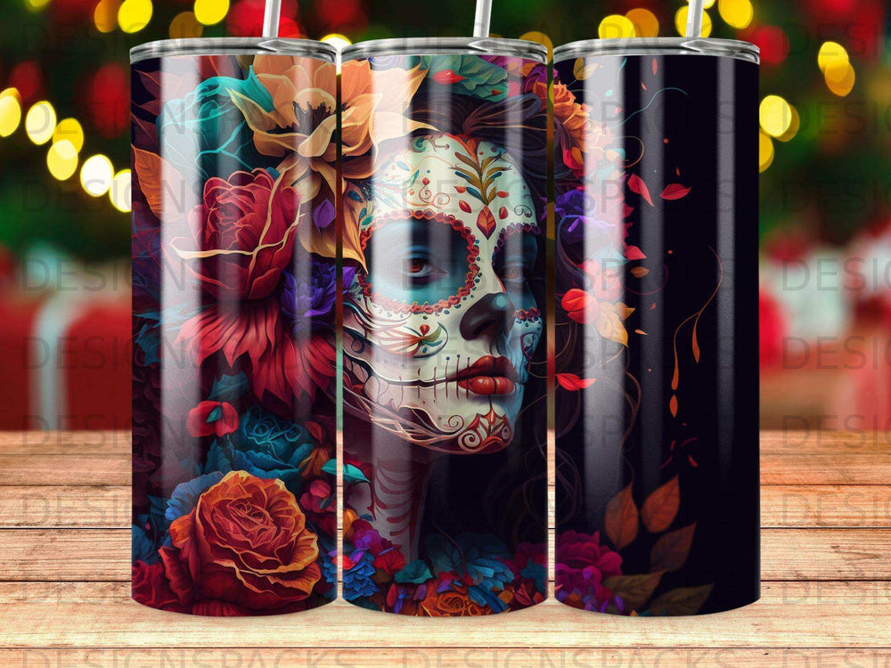 Sugar skull design with vibrant floral accents on a tumbler.