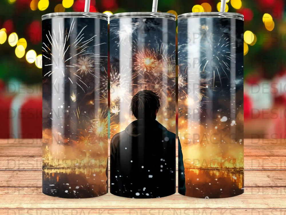 Man watching fireworks over a city skyline.