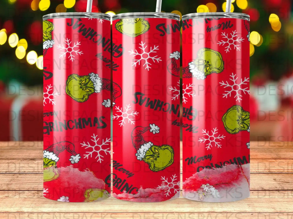 The Grinch Christmas tumbler with snowflakes and text "Merry Grinchmas".