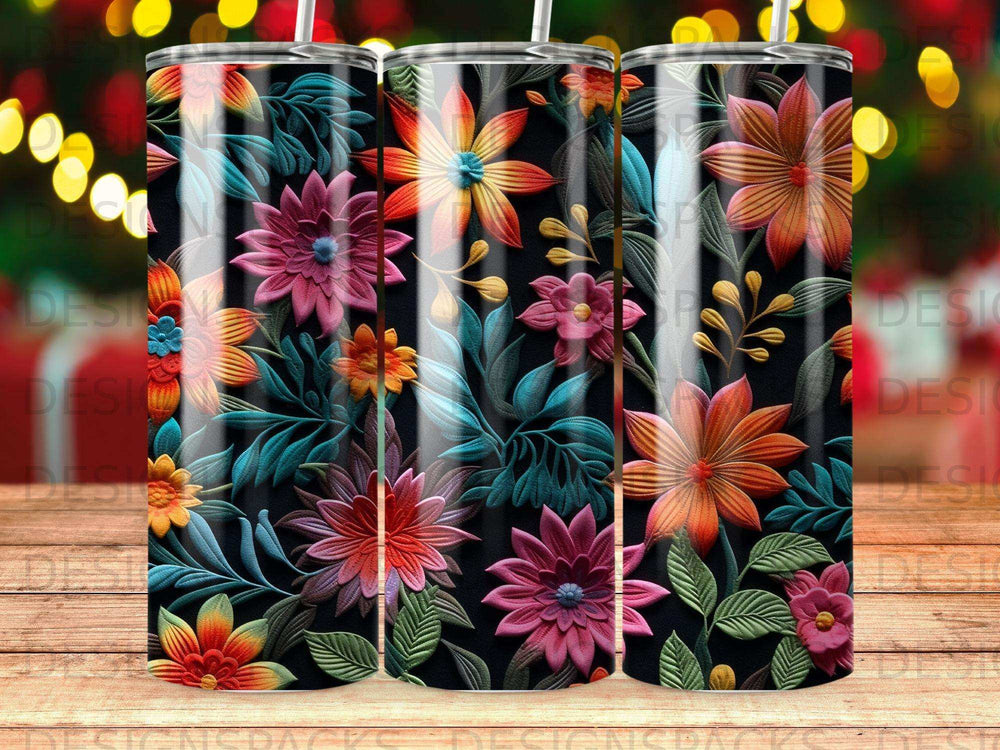Floral pattern on a black tumbler with bokeh lights in the background.