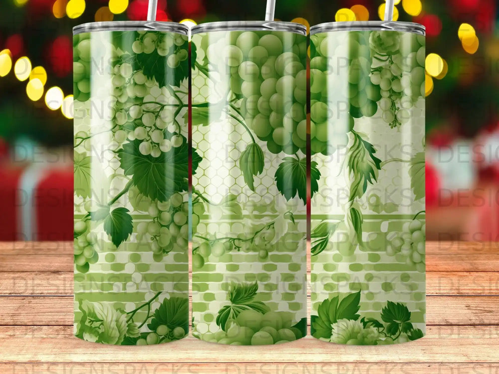Green grapes and vine pattern on a cylindrical tumbler.