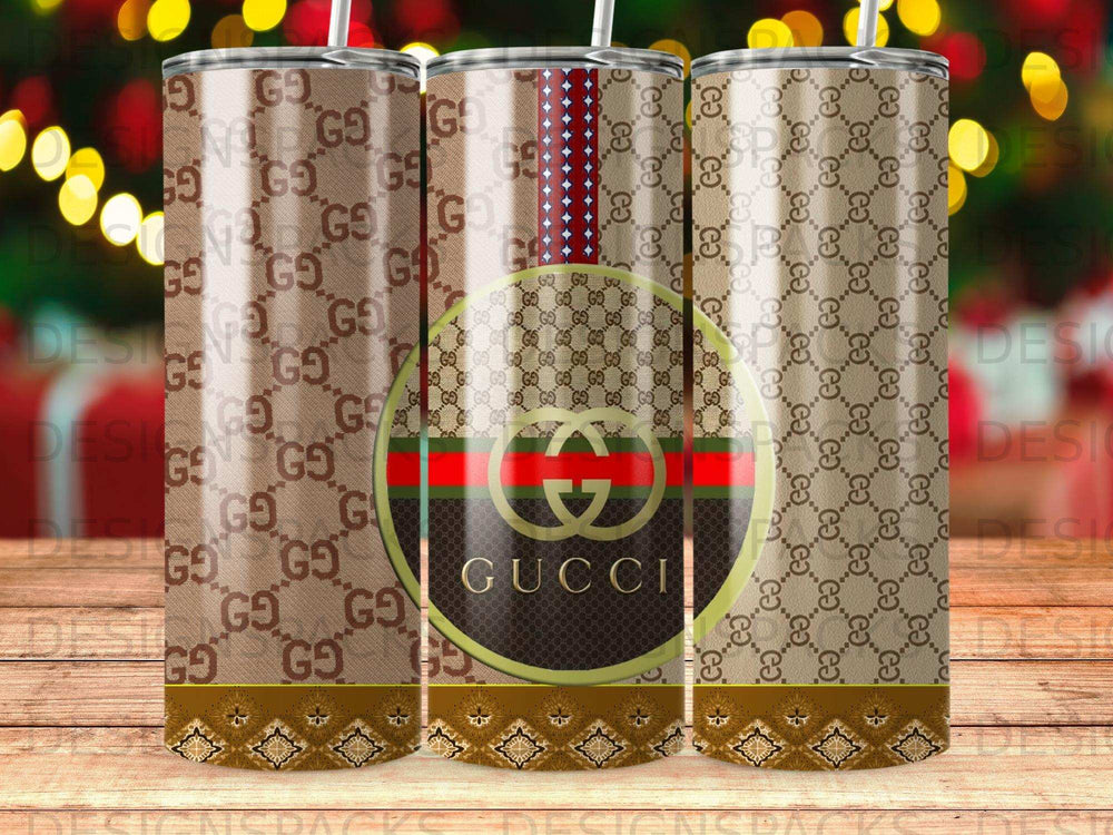 Gucci tumbler with brown GG pattern and green red stripe.