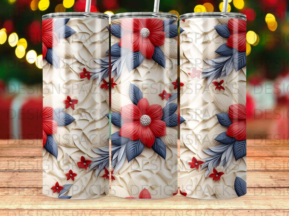 White tumbler with floral and leaf pattern, red flowers and blue leaves.