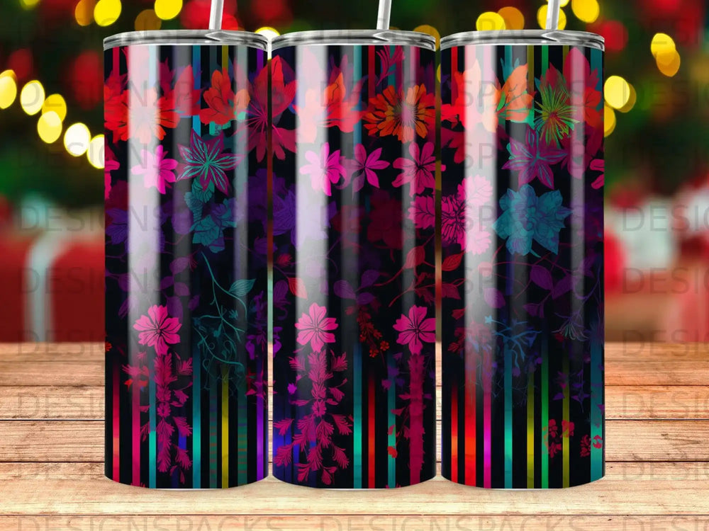 Tumbler with colorful floral pattern and striped background.