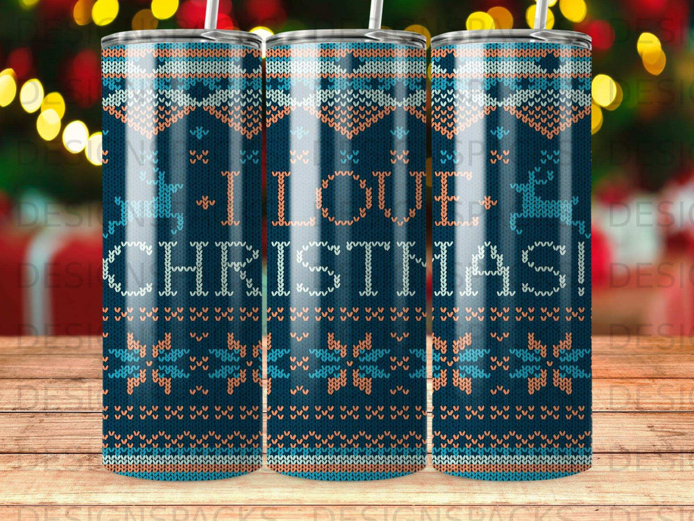 Blue tumbler with "I Love Christmas!" in a knitted pattern, snowflakes, and festive lights.