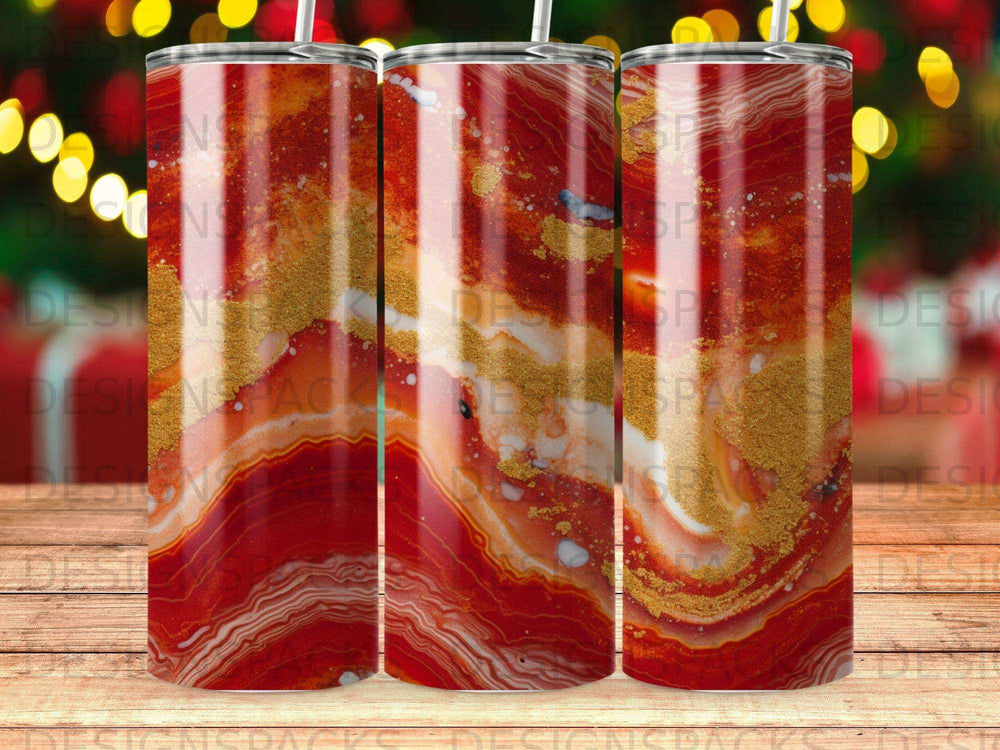 Red and gold marbled tumbler with glitter accents.