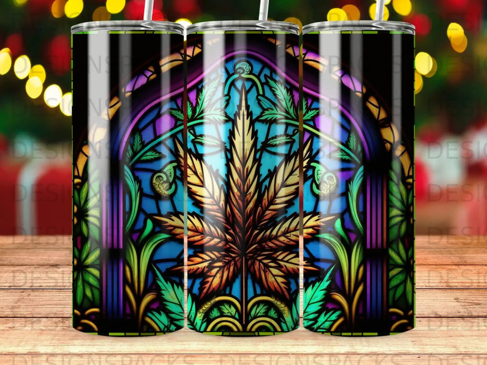 Stained glass tumbler featuring a marijuana leaf design.