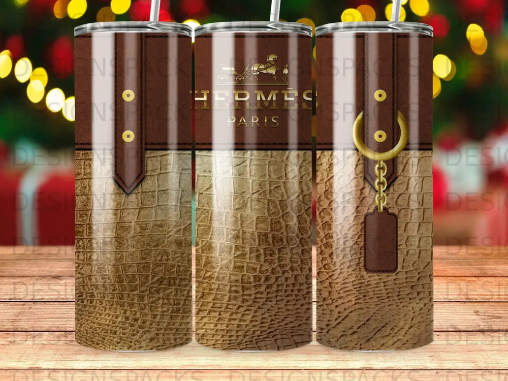 Hermes Paris logo on a brown crocodile textured tumbler.