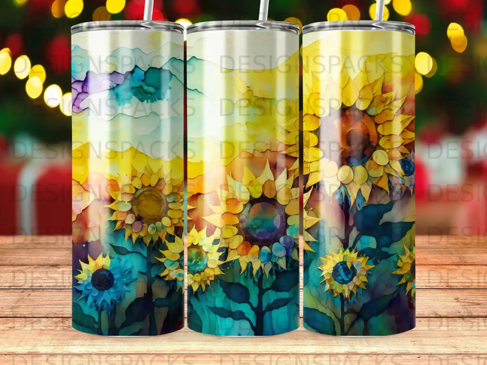 Three tumblers featuring a close-up watercolor painting of sunflowers and dark leaves.