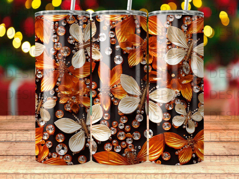 Tumbler with cascading orange floral petals and clear embellishments.