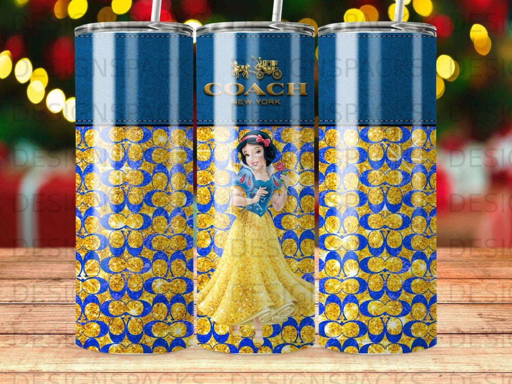 Coach New York tumbler with Snow White and gold Coach pattern.