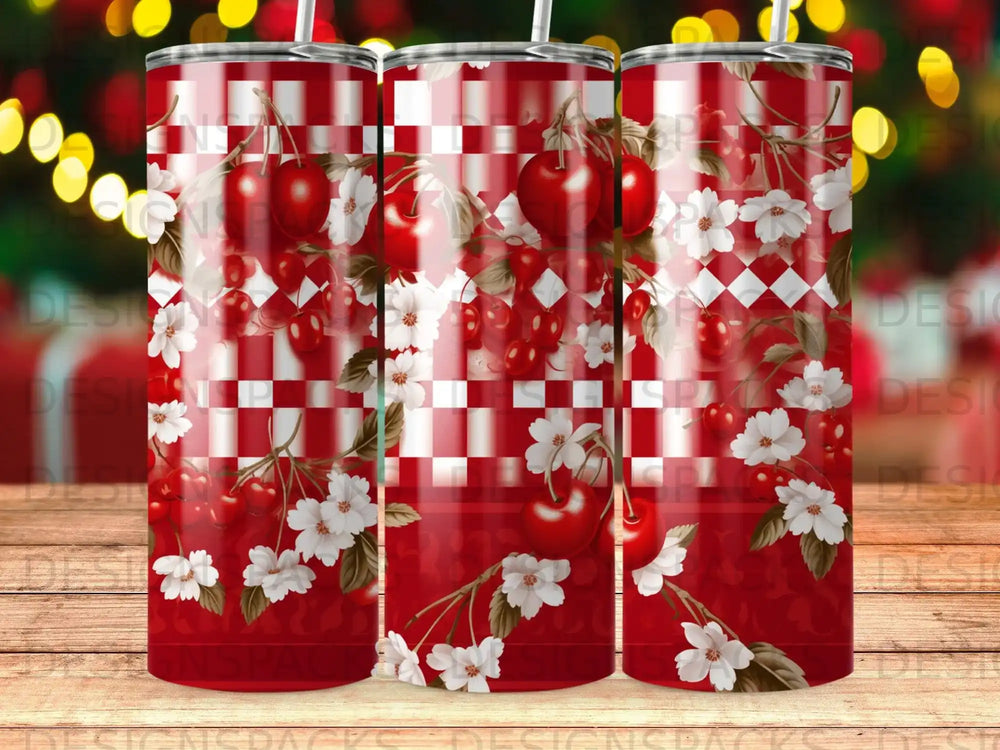 Red tumbler with cherries, white flowers, and checkered pattern.