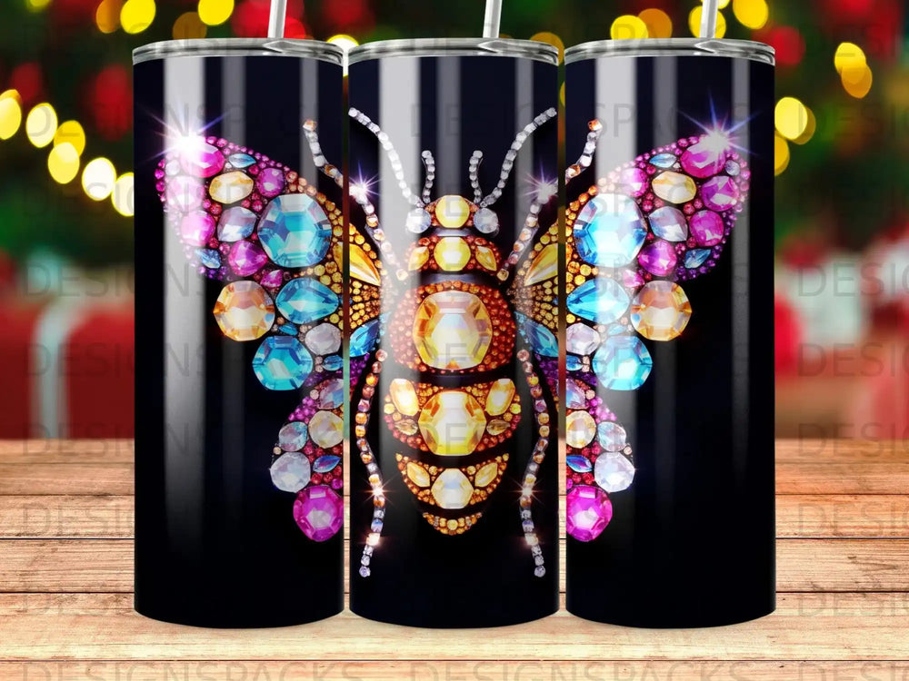 Black tumbler with jeweled bee design.