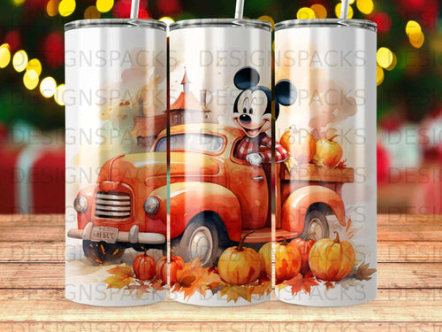 Mickey Mouse driving a vintage truck filled with pumpkins and fall leaves.