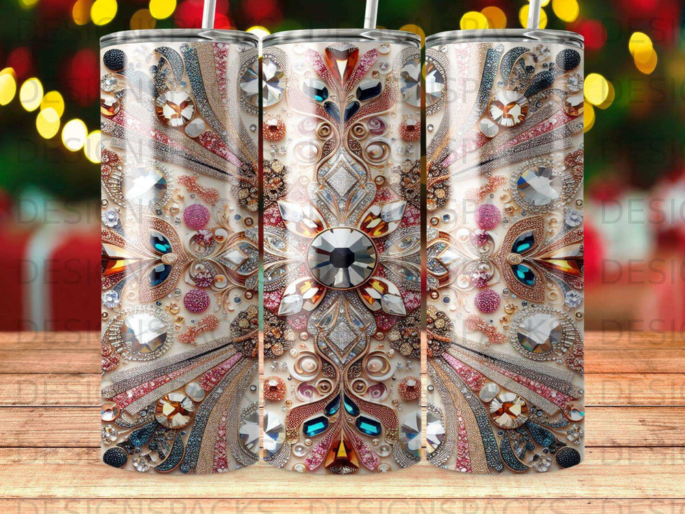 Triptych of tumblers with intricate jeweled and metallic floral designs.