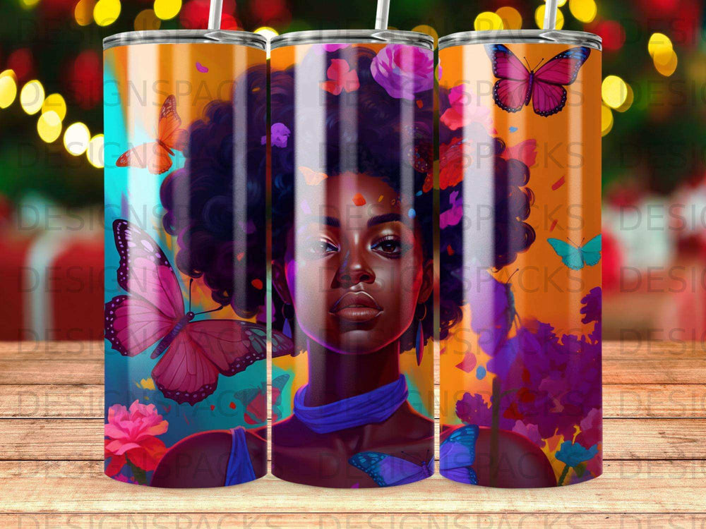 Colorful tumbler with a portrait of a woman with butterflies and flowers.
