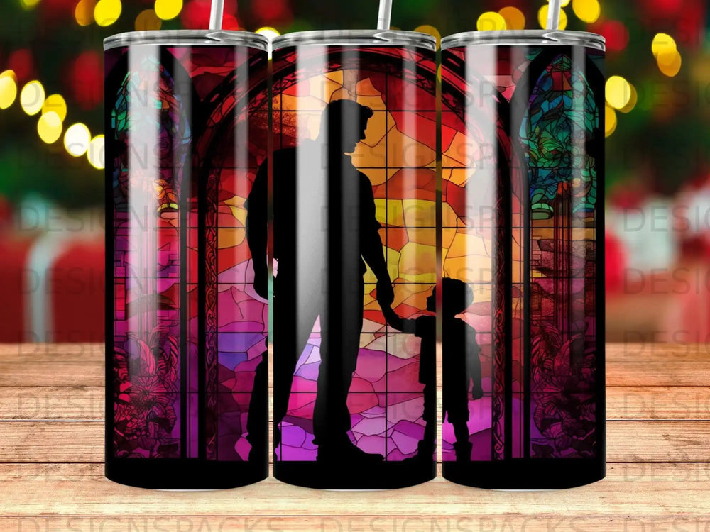 Silhouette of father holding child's hand against stained glass window.
