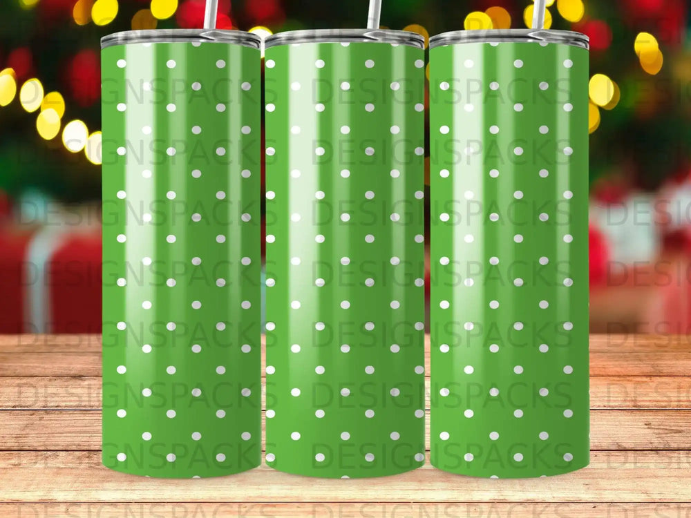 Green tumbler with white polka dots, featuring "DESIGNSPACKS" watermark.