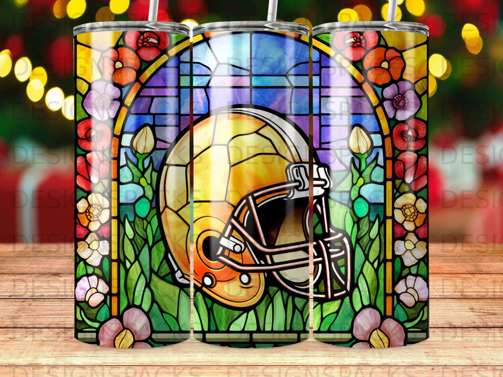 Golden football helmet against a stained-glass window with floral border.