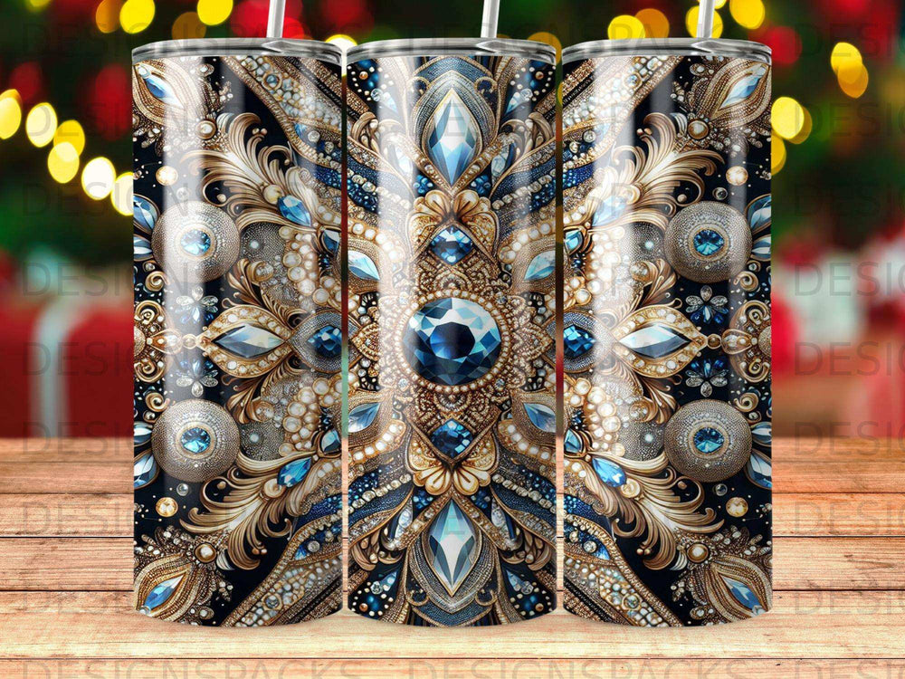 Ornate blue and gold jeweled tumbler with a dark patterned background.